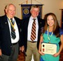 Paul Harris Fellow recipient Lauren Mack and and proud father Tom with presenter Tom Miller